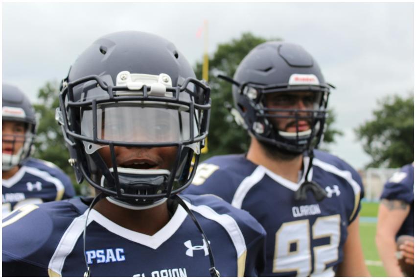 Close-up of American football players in action, w
