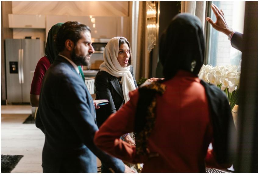 A diverse group in business attire having a meetin