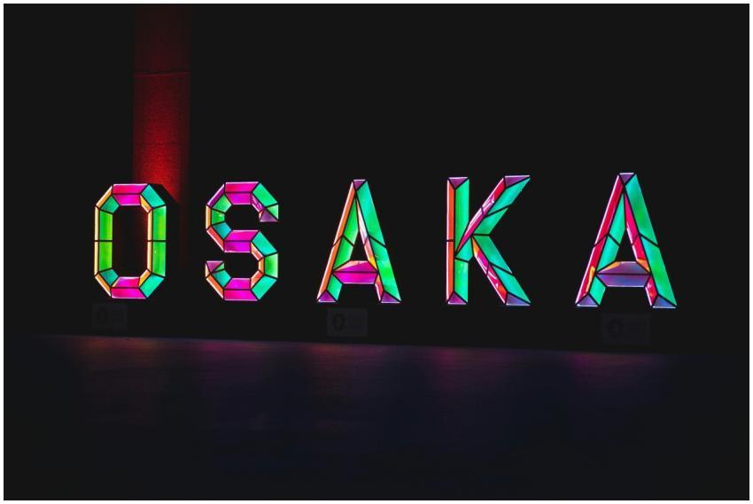 Colorful neon sign spelling 'Osaka' in geometric d