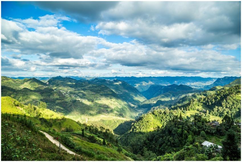 Stunning view of lush green mountains under a clou