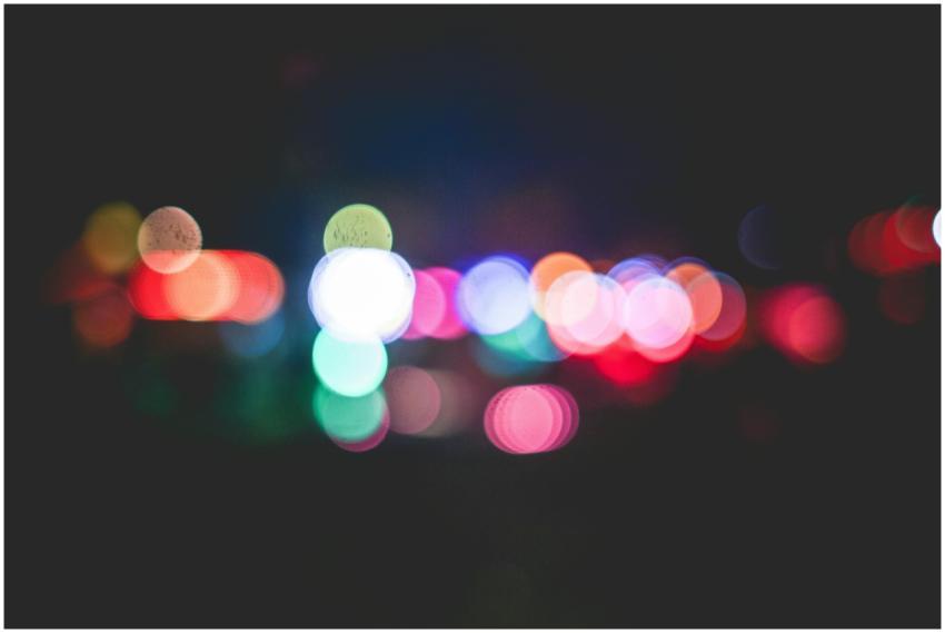 Blurred bokeh lights in various colors create a vi