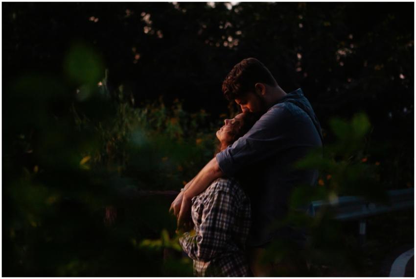 A couple shares a tender embrace in a peaceful for