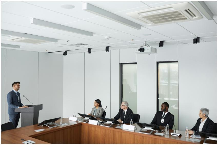 Business presentation with diverse colleagues in a