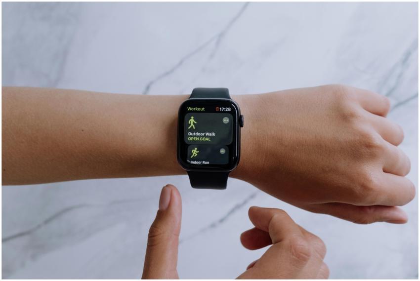 Close-up of a smartwatch on a wrist displaying hea
