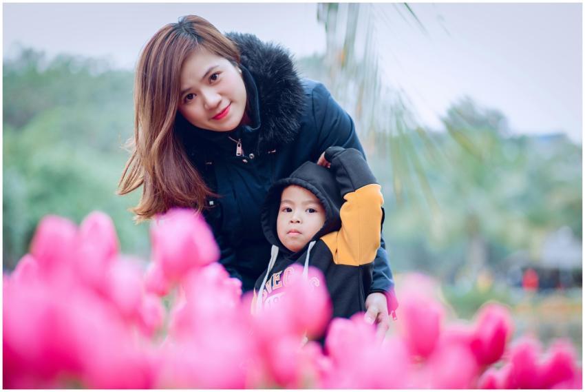 A mother and child enjoying a day in a vibrant tul