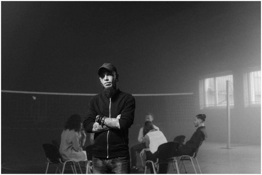 Black and white photo of a group therapy session i