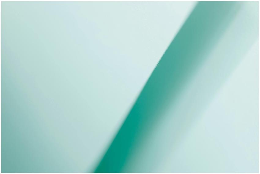Abstract turquoise gradient background featuring a