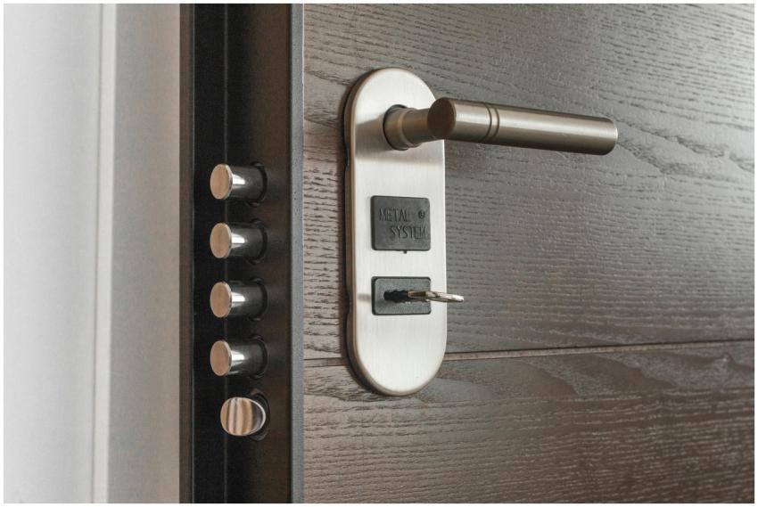 Metal door handle and lock system with key inserte