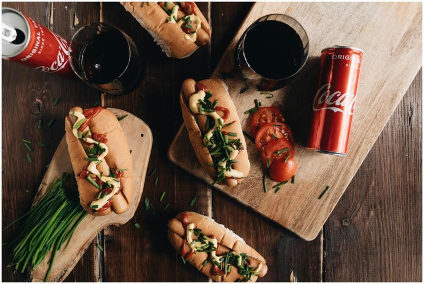 Tasty homemade hot dogs topped with chives, alongs