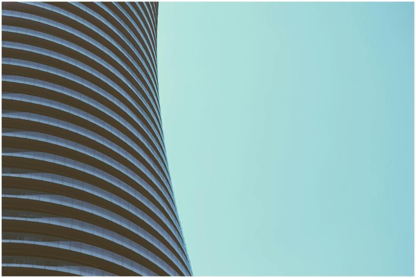 Close-up of a modern curved high-rise building wit