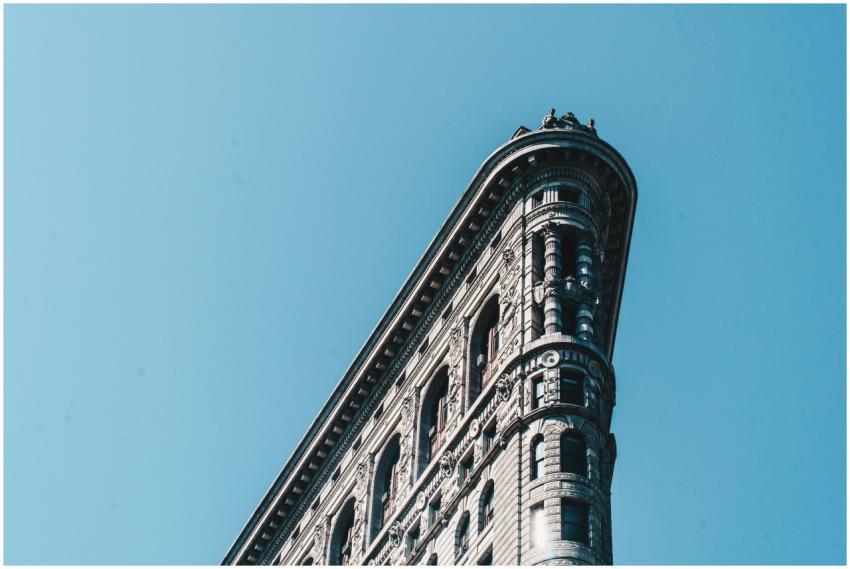 Iconic Flatiron Building in New York City under a