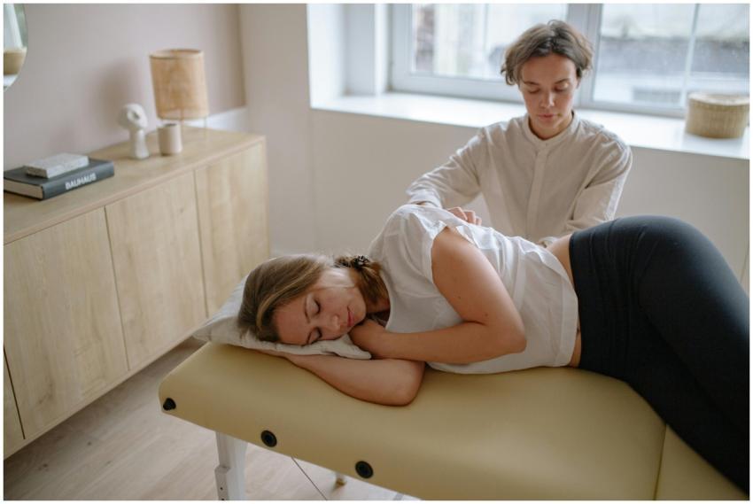 A woman receives a therapeutic massage from a spec