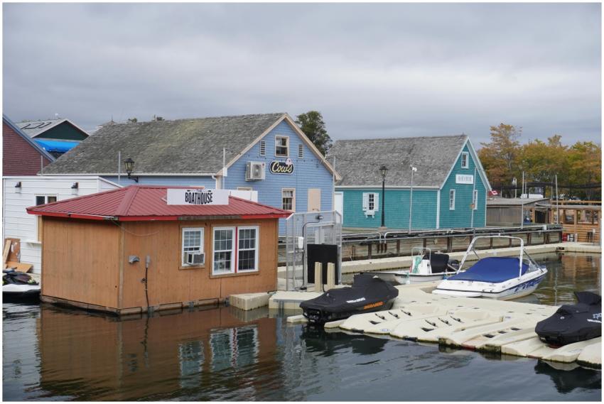 Charming coastal marina featuring colorful boathou