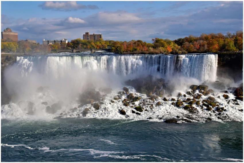 Majestic view of Niagara Falls with vibrant autumn