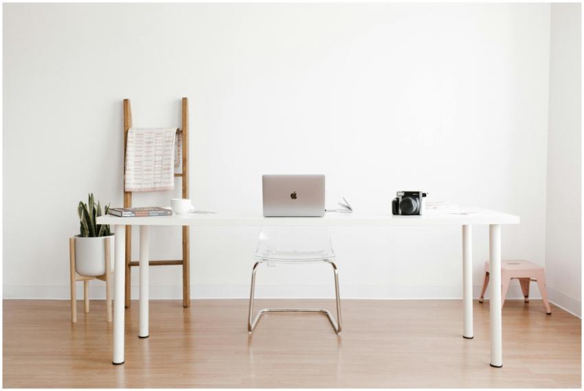 Bright and minimalist home office setup with a whi