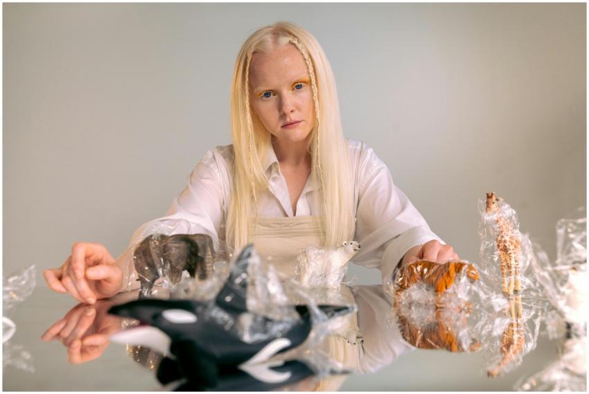 Artistic portrait of a woman with long blonde hair