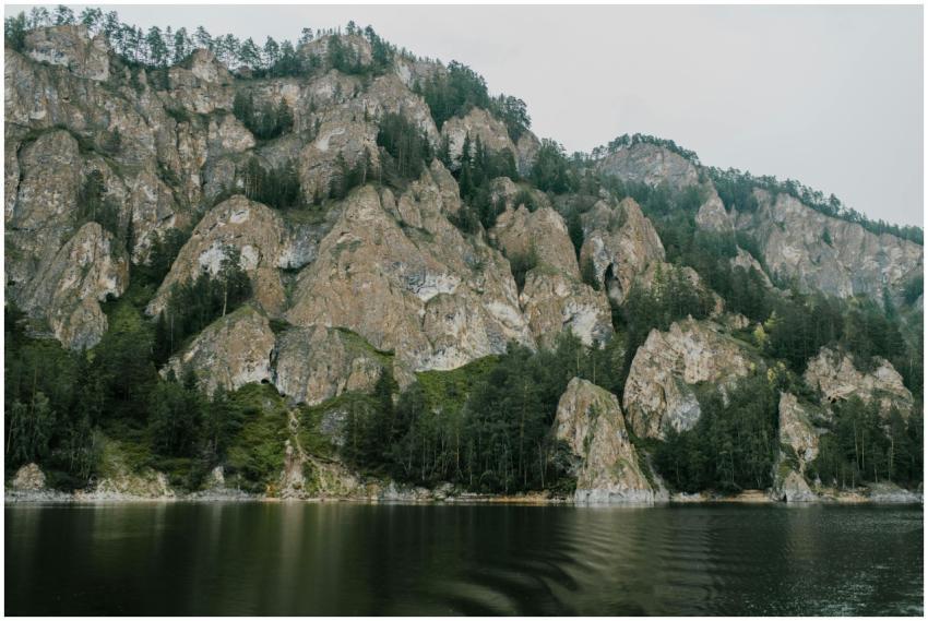 Beautiful rocky cliff formations surrounded by lus