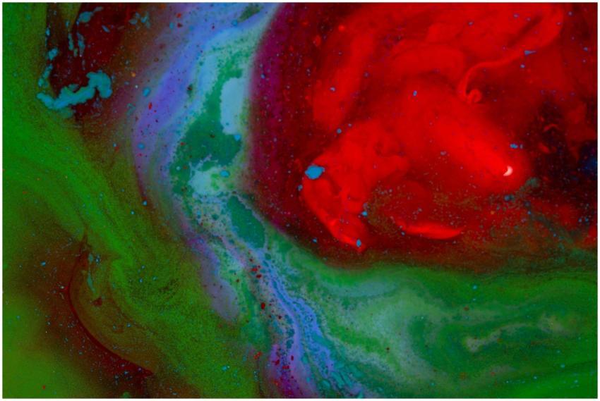 Dynamic abstract art with vivid red, green, and bl