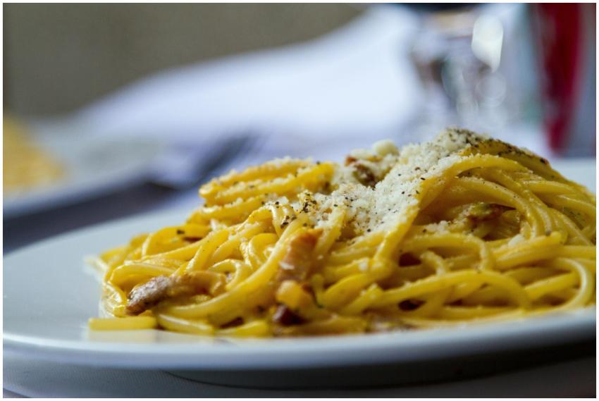 Close-up of spaghetti carbonara topped with grated