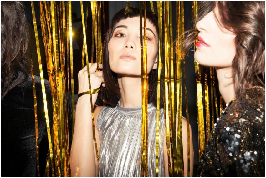 Adult women enjoying a vibrant night party with go