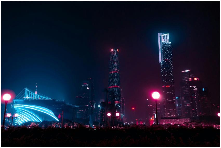 Illuminated skyscrapers and street lights in Guang