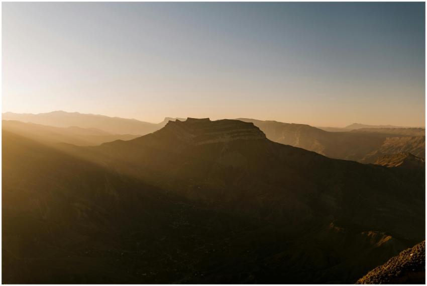 Spectacular view of mountains at sunset with warm