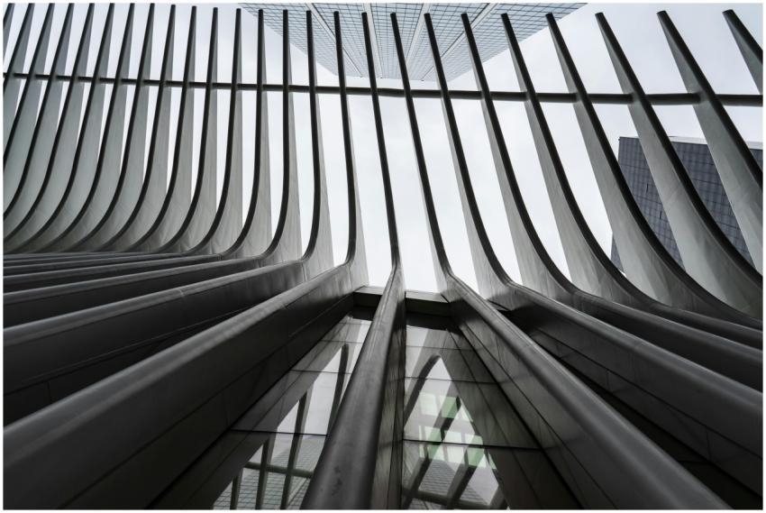 Low angle view of a futuristic building's steel an