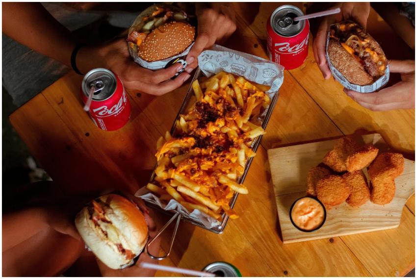 Delicious fast food spread featuring burgers, frie