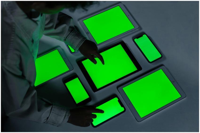 A variety of electronic gadgets with green screens