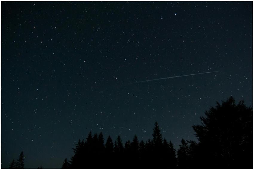 A breathtaking view of a starry night sky above a