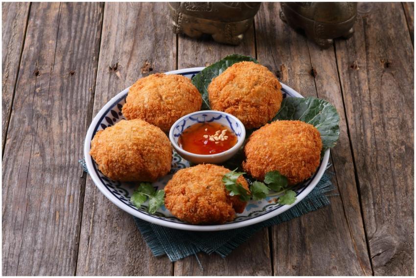 Delicious fried fish cakes served with spicy dippi