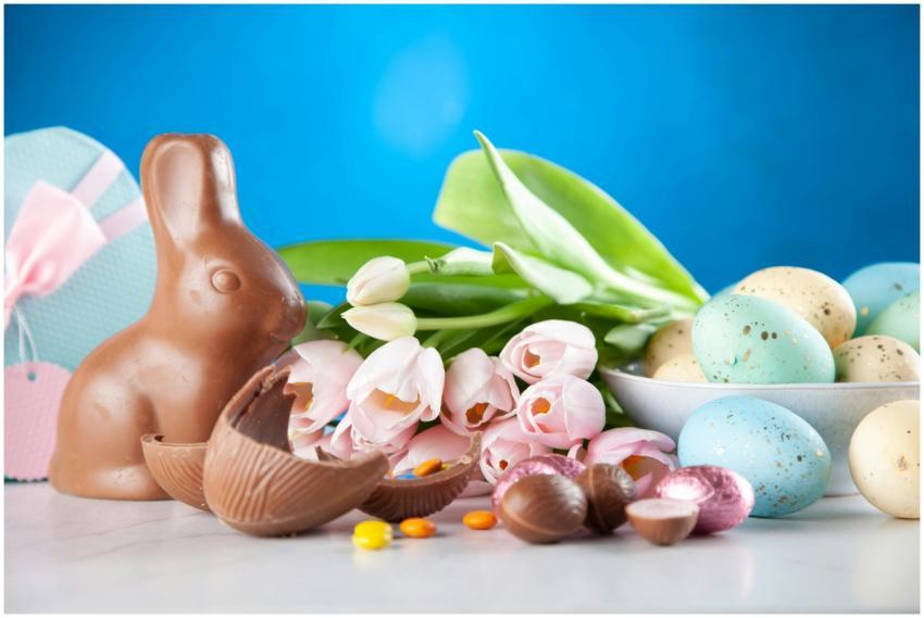 A vibrant Easter display featuring a chocolate bun