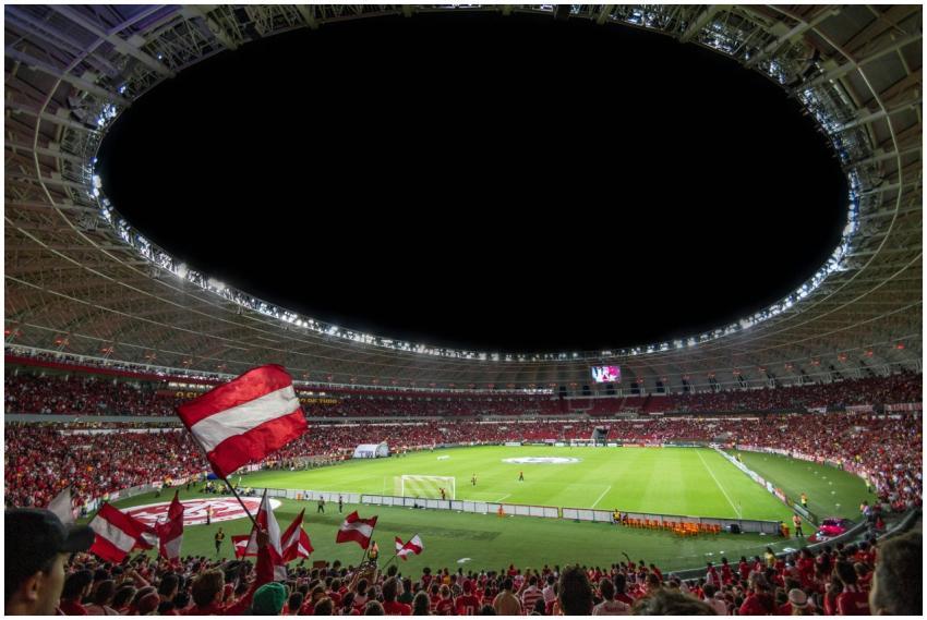 Exciting soccer match with enthusiastic fans in a