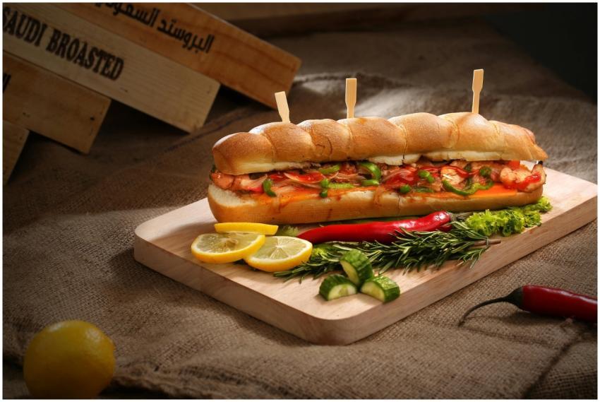 Mouth-watering sandwich with vegetables and sausag