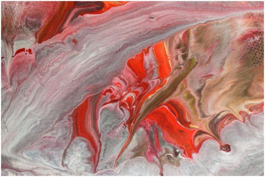Colorful fluid painting with red and earthy tones,