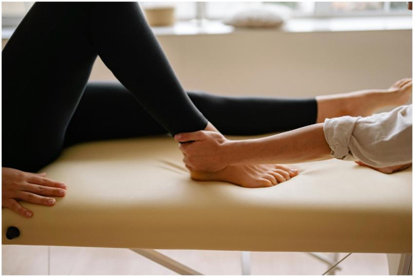 Close-up of a therapist performing a foot massage
