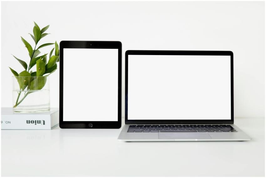 Modern minimalist workspace featuring a laptop and