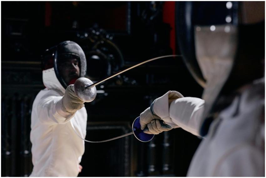Intense fencing match scene showcasing athletes mi