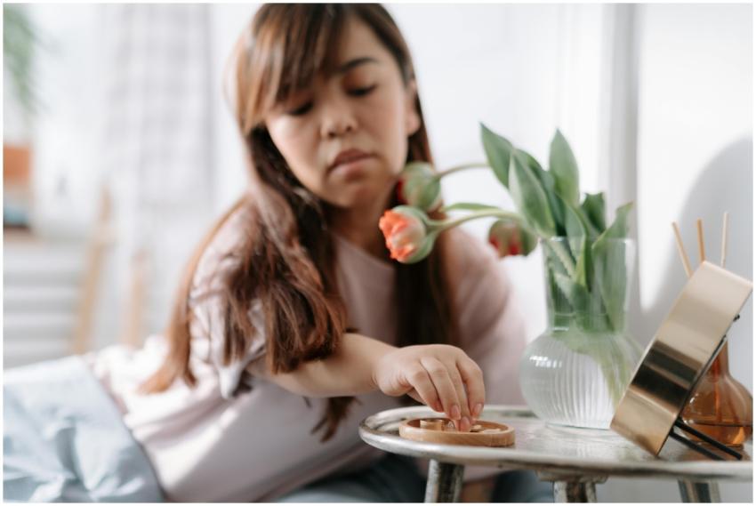 Woman setting up morning essentials with fresh tul