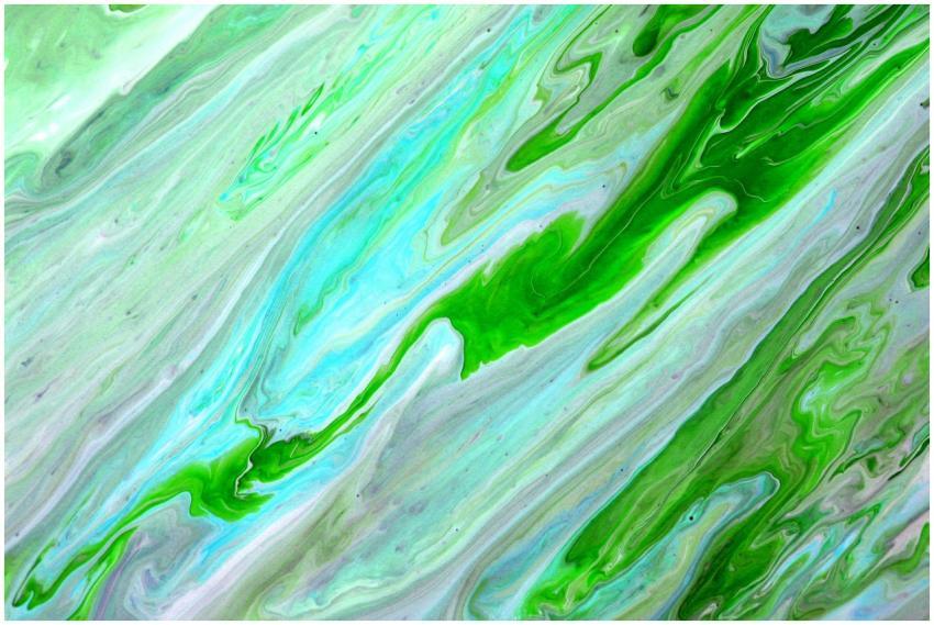 Vibrant abstract fluid painting in green and blue