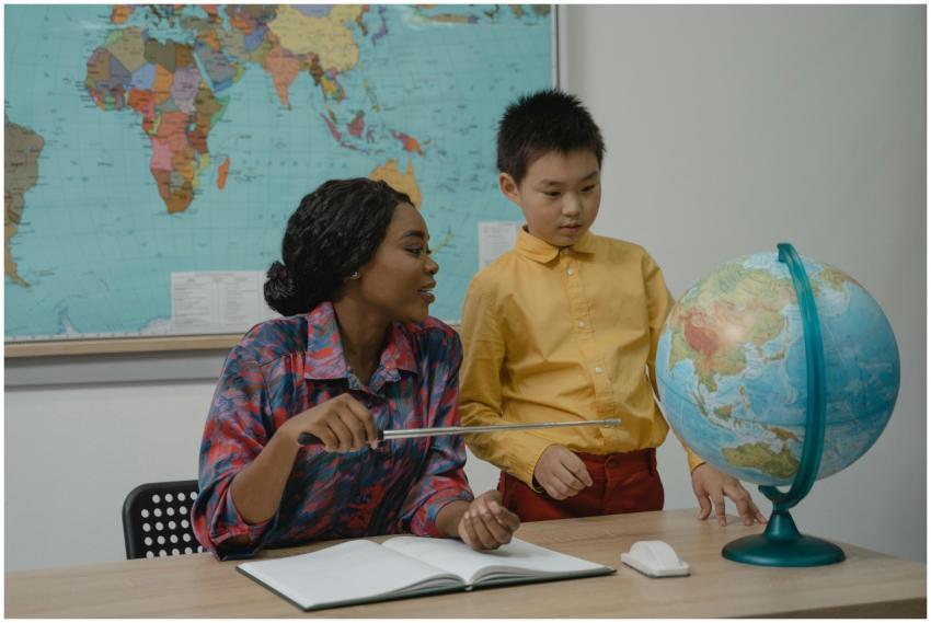 A teacher explaining world geography to a student