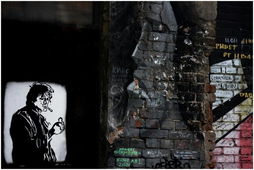 Intricate street art with murals and graffiti on a