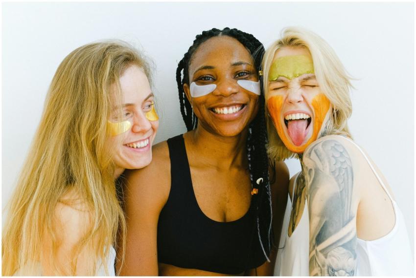 Three diverse women having fun with colorful skinc