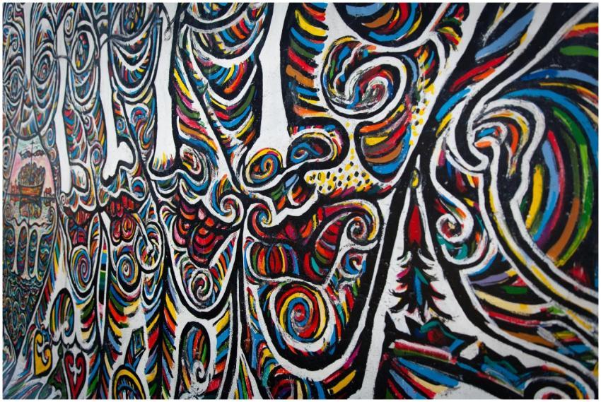 Colorful abstract mural art depicting swirling pat
