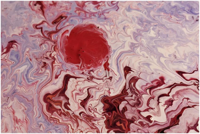 Dynamic marbled design with vivid red and purple h