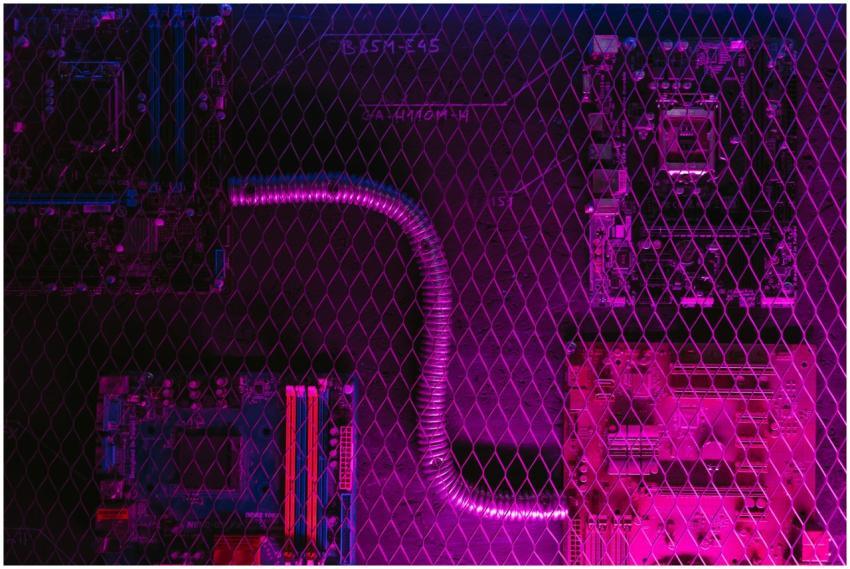 Abstract image of motherboard circuits with a neon