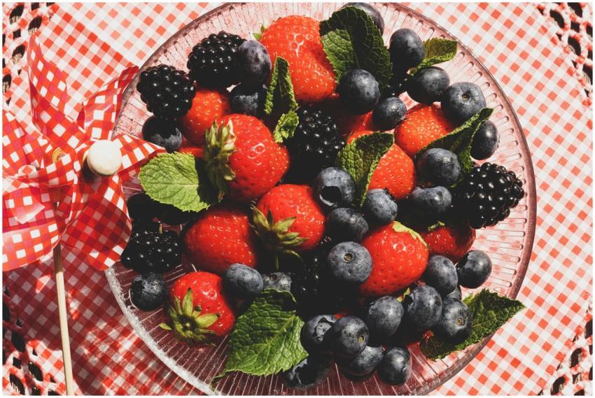 A vibrant mix of strawberries, blackberries, and b