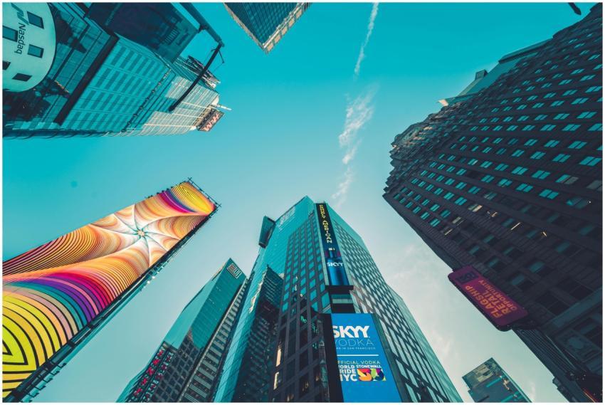 A low angle view of colorful skyscrapers in New Yo