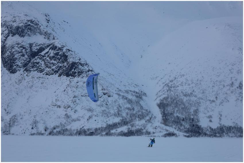 A thrilling snowkiting experience against the snow