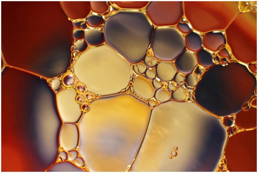 Close-up of colorful oil and water interaction cre